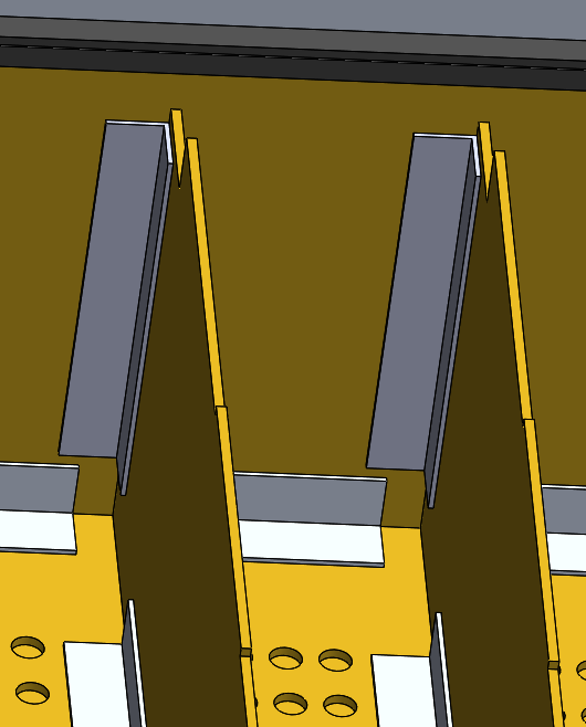 Close up of the epoxied L-brackets used to fasten the old enclosure. This is a approach that caused alignment issues and inconsistent bonding.
