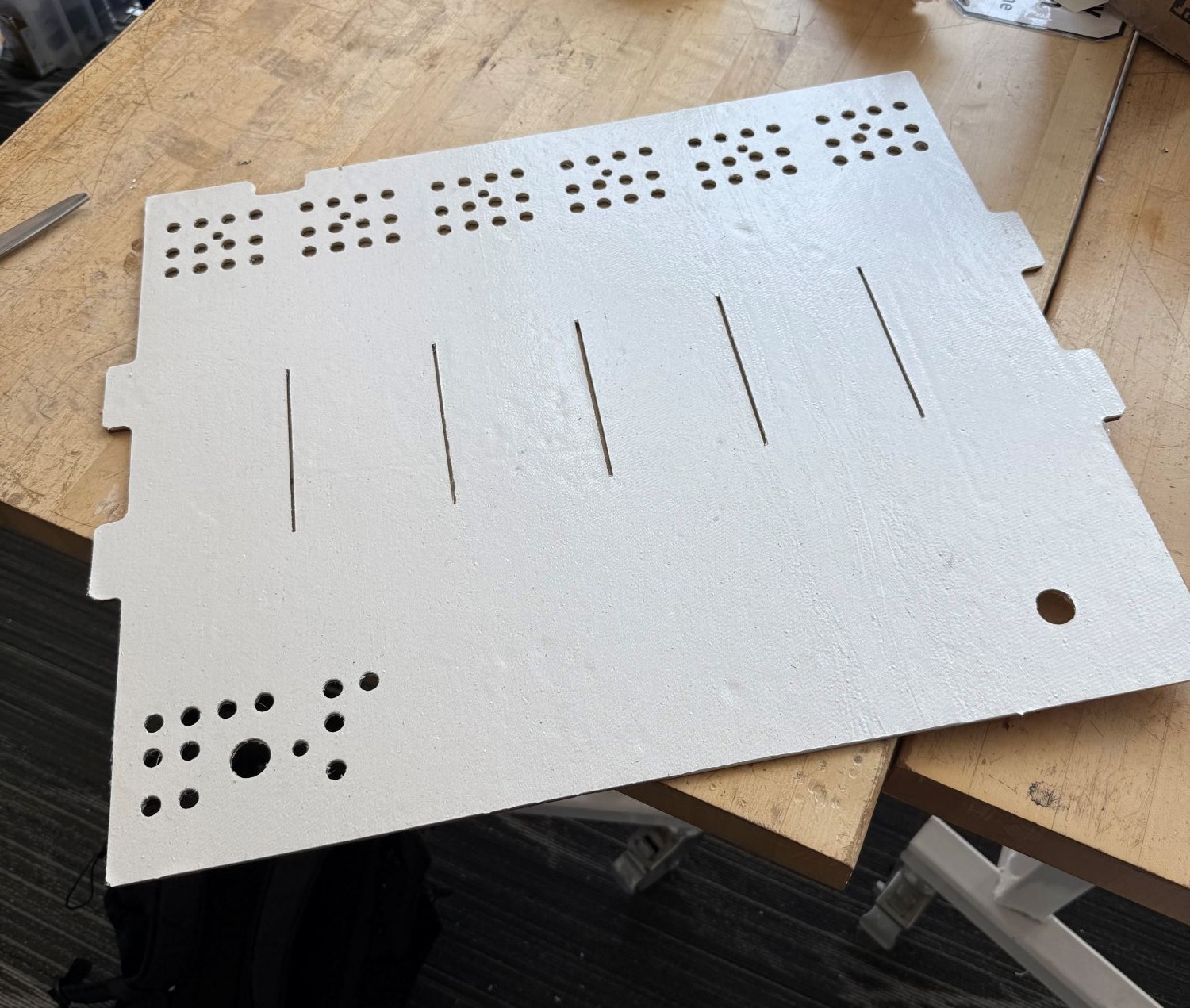 Installation of Protexx-Shield® insulation on the enclosure lid